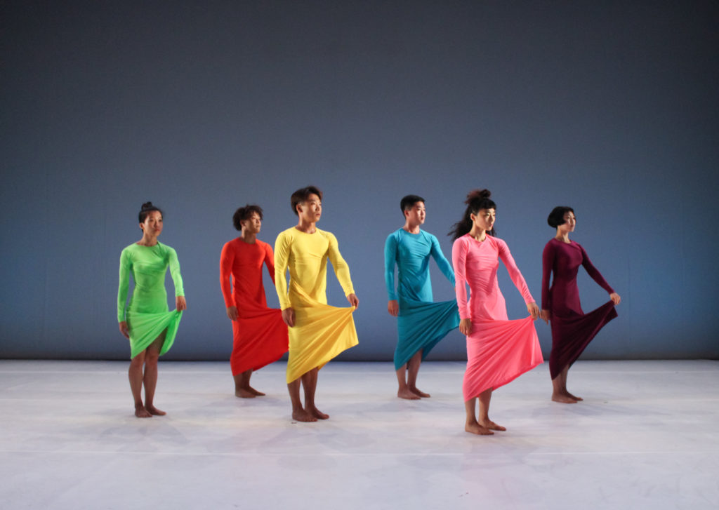 6 dancers in colourful dresses