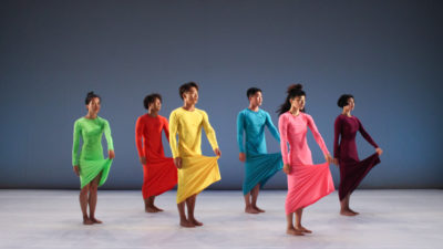 6 dancers in colourful dresses