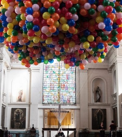 Installation of an inside of a church filled with ballons