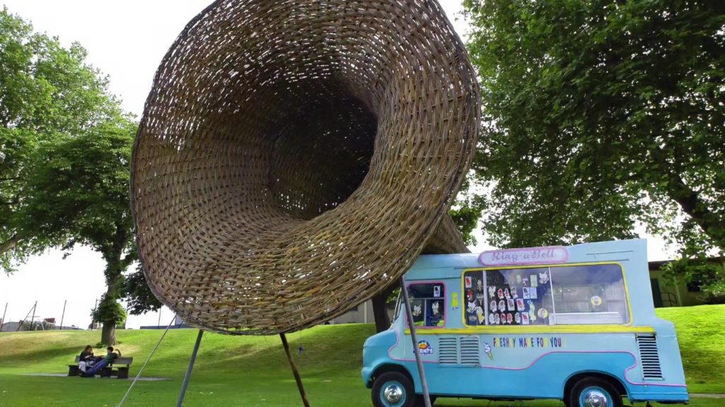 An ice-cream van with a giant wicker horn