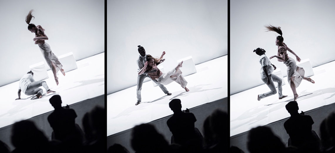 Three still images side by side, showing two dancers in three different moments performing on a white spotless stage, in front of the dark silhouettes of the audience.