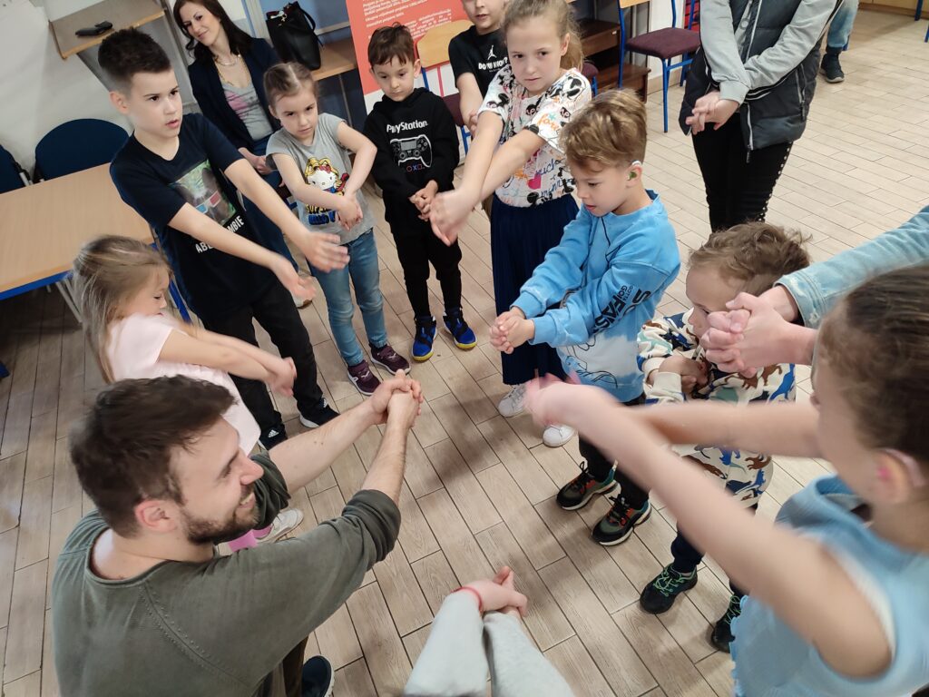 A workshop for children led by a deaf artist