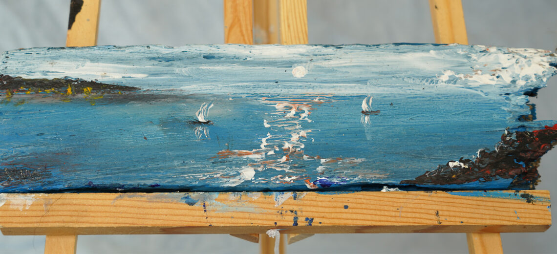 A painting of ships fishing in a bay done on a long piece of driftwood.